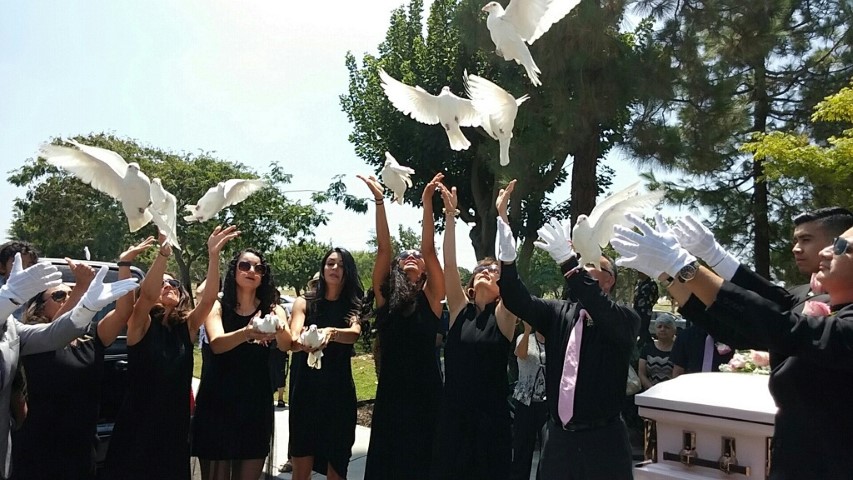 White-Doves-Release-at-Funeral-Los-Angeles-by-Romeros-White-Doves-Family-Members-Releasing-White-Doves-at-Cemetery